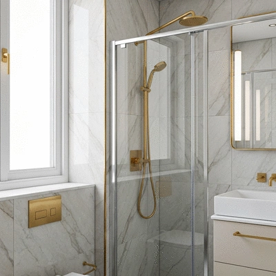 Modern luxury bathroom with marble tiles and gold fixtures